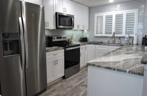 Sand Key Condo | Pool and Hot Tub open! Beachfront Floor to Ceiling Views of Sand Key Beach!