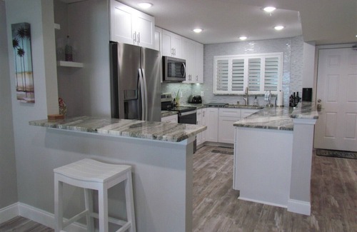 Sand Key Condo | Pool and Hot Tub open! Beachfront Floor to Ceiling Views of Sand Key Beach!