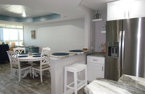 Sand Key Condo | Pool and Hot Tub open! Beachfront Floor to Ceiling Views of Sand Key Beach!