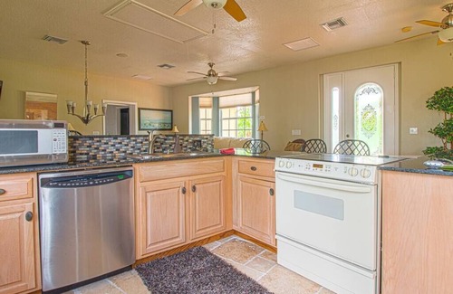 South Gulf Cove House | Pool Home on Saltwater Canal Accommodating 10