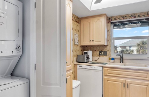 Avon By The Sea Condo | Poolfront 2BR Condo W/BBQ Steps To Beach & Pier, Space Center & Parks!
