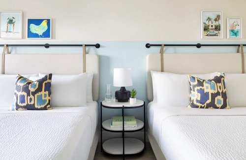 New Town Hotel | Poolside Paradise l Fire Pits, Lawn Games, Live Music & Endless Fun