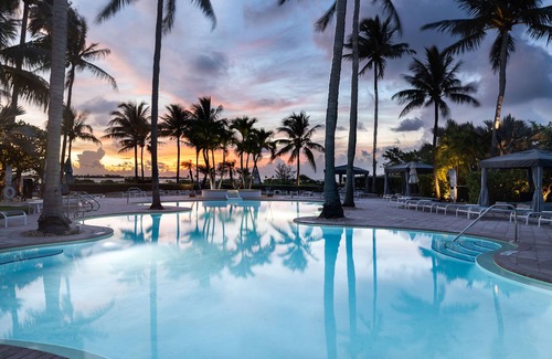 Marathon Apartment | Poolside Room | Direct Pool Access + Lanai