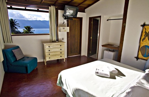 Veloso Hotel | Pousada Isola Bella - Sobre o Mar