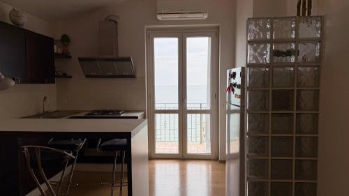 Porto Potenza Picena Apartment | PP01 - Porto Potenza, nuovo bilocale fronte mare con terrazza panoramica