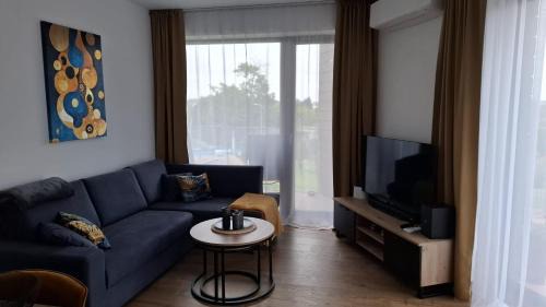 Mikolajki Apartment | Pratum Plus prywatny ogród z tarasem grill leżaki