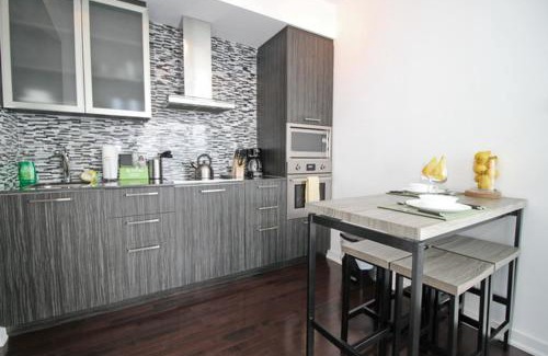 Toronto Entertainment District Apartment | Presidential 2+1BR Condo, Entertainment District (Downtown) w/CN Tower View, Balcony, Pool & Hot Tub