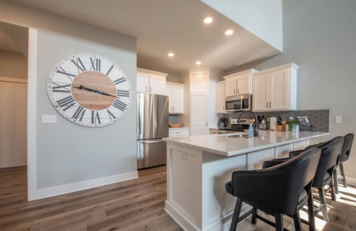 Smithville House | Primary bedroom, living room, and kitchen on main floor - no steps!