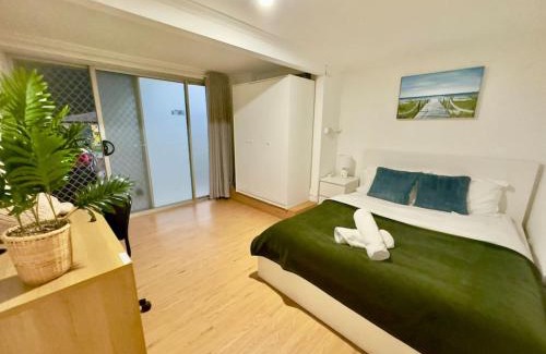 Macgregor Apartment | Prime 1BR Near Transport and Retail