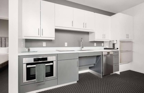 Iowa City Hotel | Prime Downtown Iowa Stay – 2 Elegant Units Near Campus & Live Music