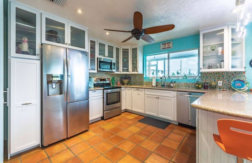 Pine Channel Estates House | Prime Time: A Tropical Paradise on Big Pine Key, Canal Front Duplex, Swift Access to Atlantic & Gulf