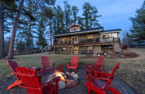 Emily House | Pristine home with sandy beach, firepit, dock and pontoon. ATV trails nearby.