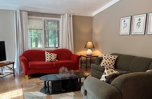Candle Lake House | Privacy Galore! Enjoy this roomy year round lake home surrounded by the forest