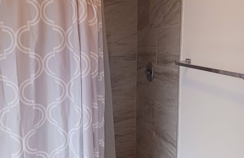 Westminister House | Private 1-BR suit in house with WiFi, AC, living, dining, fridge and microwaive