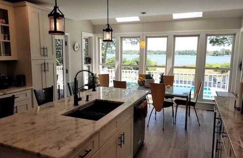 Mastic House | Private, 3-acre, waterfront escape w/pool, firepit, game rm & spectacular views