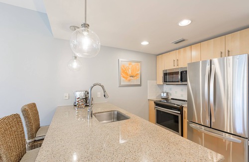 Baytowne Wharf Condo | Private Balcony ~ Community Pool ~ Fitness Center
