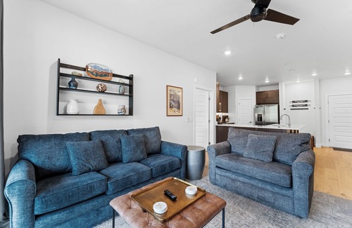 Lakeside Village Condo | Private Balcony with Cozy Outdoor Seating & Mountain Views! 2 Shared Hot Tubs