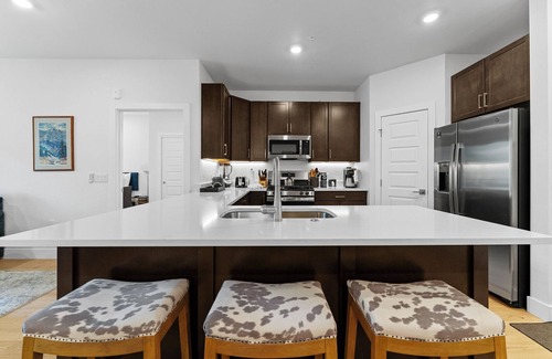 Lakeside Village Condo | Private Balcony with Cozy Outdoor Seating & Mountain Views! 2 Shared Hot Tubs