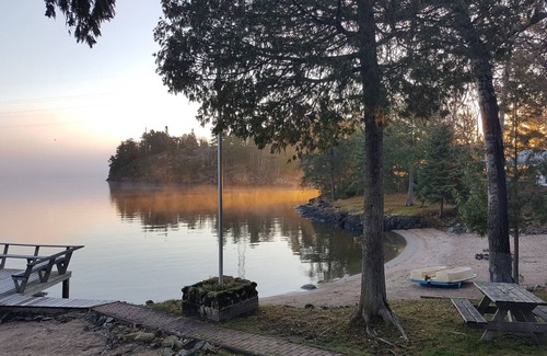 Sioux Narrows Nestor Falls Cottage | Private Beachfront log cabin Lake of the Woods