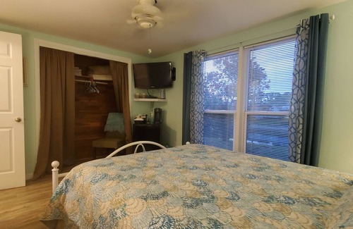 New Port Richey Bed & Breakfast | Private bedroom and private bath at separate end of home with water views.