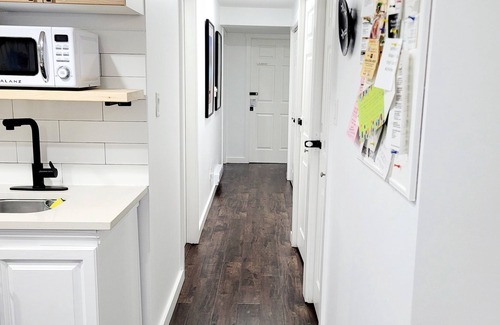Surrey House | Private Bright Basement Suite