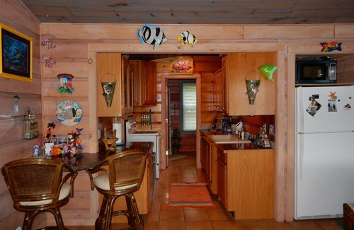 Hayward Cabin | PRIVATE CABIN ON CHIPPEWA FLOWAGE , MOORES BAY. TROPICAL ATMOSPHERE, 100 FT DOCK