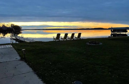 Shawano Cottage | Private Dock, Private Sand Beach and Shawano Lake's Only Boathouse Bar with a TV