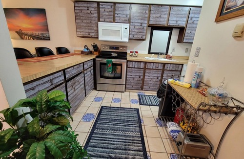 Lawrence House | Private fun rental Video Game, massage Chair, fenced-in yard