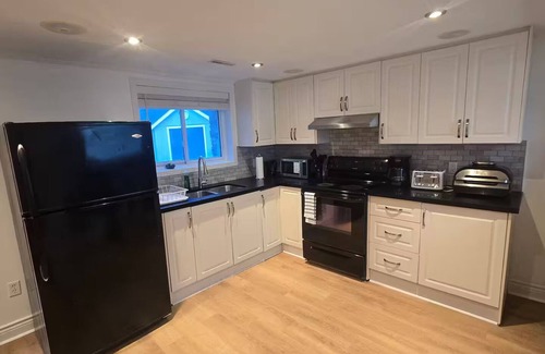 Aurora House | Private Guest House- A Beautiful Walkout Basement