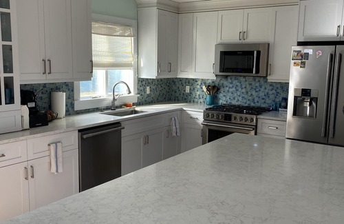 Silver Beach House | Private heated pool and spacious yard. 5 minute walk to the beach.