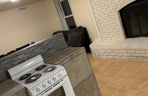 Cedar Rapids House | Private In town quiet retreat 12+ Downstairs Bonus Kitchen and walkout quarters.