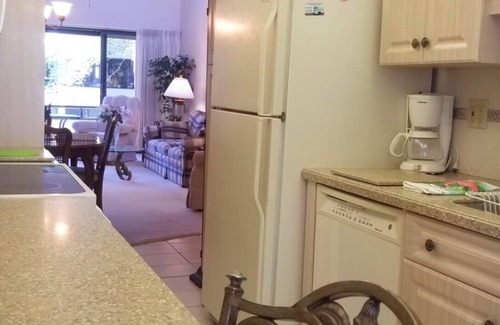 Venice Condo | Private Lanai overlooking Beautiful Garden just 100 Feet to Pool, Deck and Beach