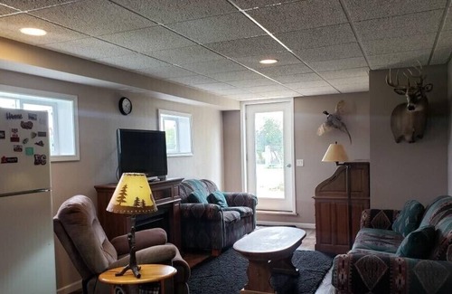 Elkhart Lake Cabin | Private lower level house with a kitchen . Come and visit the 🐺🦌🦬🦢