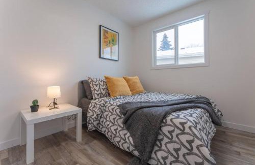 Southeast Calgary House | Private neat and cozy room with shared living room and kitchen
