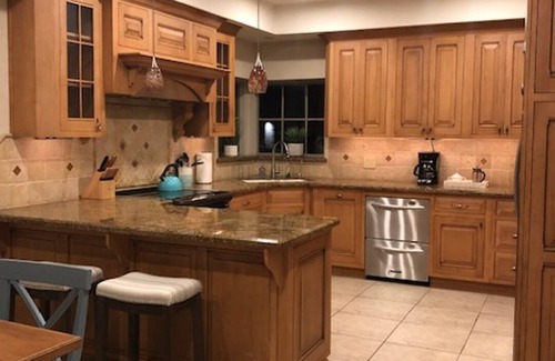 McAllen House | Private oasis in prime McAllen location with Gated Parking, Heated Pool & Spa