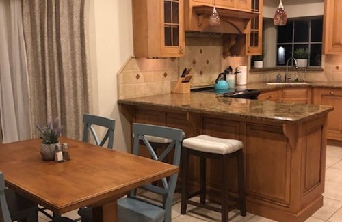 McAllen House | Private oasis in prime McAllen location with Gated Parking, Heated Pool & Spa