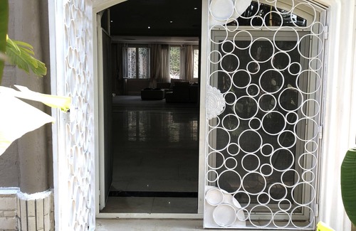 Al-'Amriyah Condo | Private resort type condo setting with full access to garden and pool