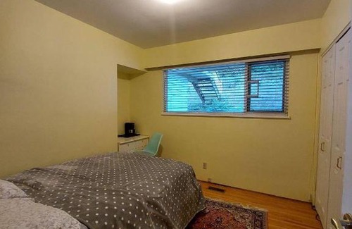 West Vancouver House | Private room with shared bathroom