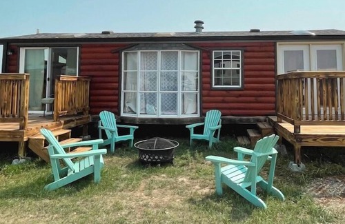 Platte RV Rental | Private Tiny Home with deck, fire pit & patio near Platte Creek Recreation area