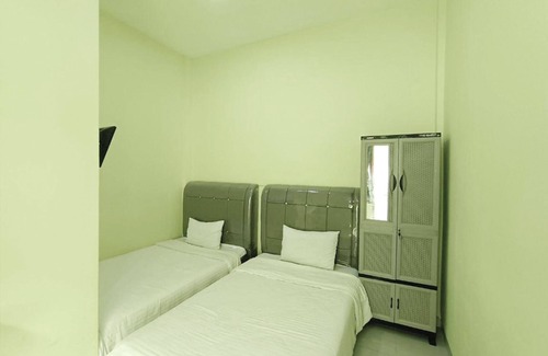 Balige Hotel | Pudan Residence Balige By Helocus
