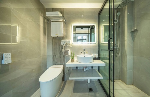 Fenghuang Hotel | Qixin Xianting Hotel