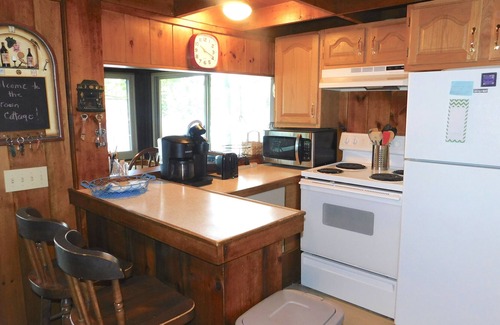 Oxford Cottage | Quaint and cozy Maine cottage on quiet Hogan Pond with large sandy beach!