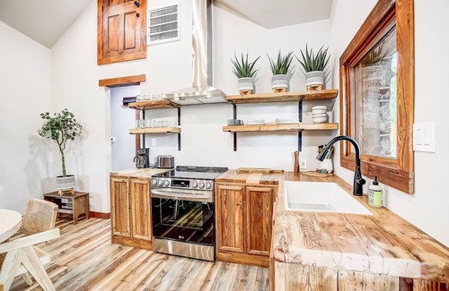 Marble Falls House | Quaint house with washer/dryer, central AC, patio, & spacious backyard