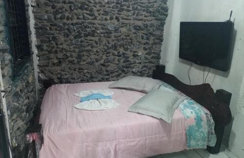 Morada do Ouro Apartment | Quarto de Pedra