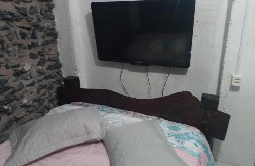 Morada do Ouro Apartment | Quarto de Pedra