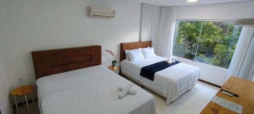 Pescaria Apartment | Quarto e sala pratagy