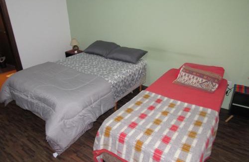 Vila Gardenia House | Quarto Pitanga