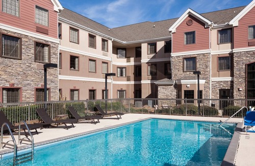 Tougaloo Apartment | Queen Studio Near IBM. Free Breakfast. Pool. Gym.
