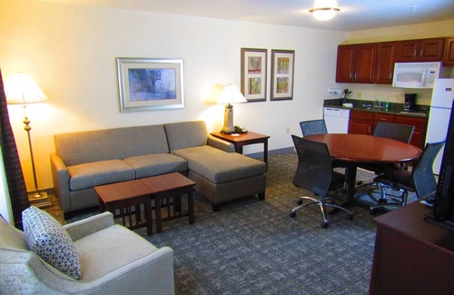 Rochester Condo | Queen Suite with In-Suite Conference Space Near the University of Rochester