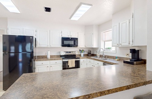 Port Isabel House | Quiet 3 bedroom home with water views, dock & private gas grill